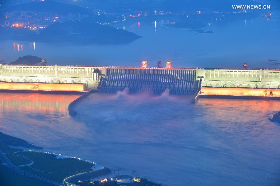 Flood water is discharged from the Three Gorges Dam, a gigantic hydropower project on the Yangtze River, in Yichang City, central China's Hubei Province, July 24, 2013. The Yangtze River, China's longest, has braced for its largest flood peak so far this year due to continuous rainfall upstream. (Xinhua/Zheng Jiayu) 