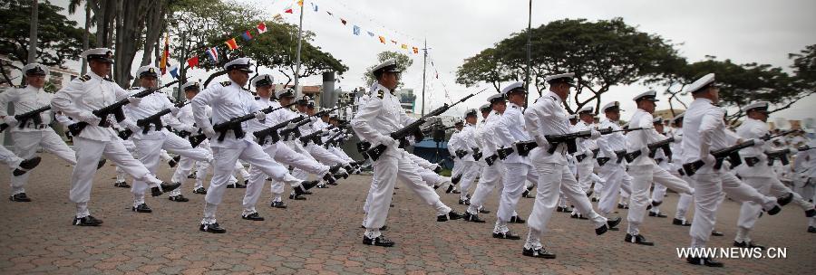 Members of Ecuador's Navy participate in the parade in commemoration of the Ecuador's Navy Day, in the city of Guayaquil, Ecuador, on July 25, 2013. (Xinhua/Santiago Armas)