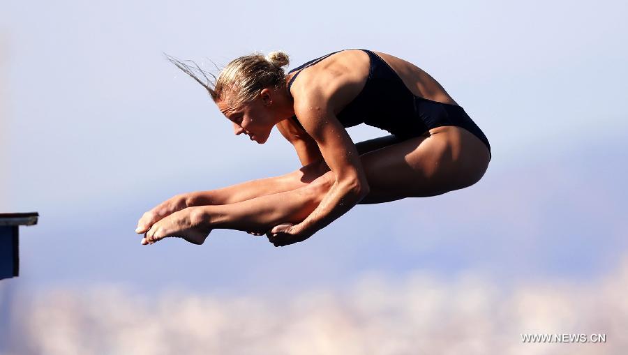 Iuliia Prokopchuk of Ukraine competes in the Women's 10m Platform Final of the Diving competition in the 15th FINA World Championships at the Piscina Municipal de Montjuic in Barcelona, Spain on July 25, 2013. Iuliia Prokopchuk took the bronze with a total score of 358.40 points. (Xinhua/Wang Lili)