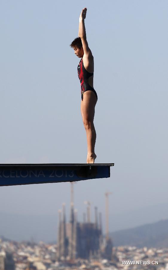 Si Yajie of China competes in the Women's 10m Platform Final of the Diving competition in the 15th FINA World Championships at the Piscina Municipal de Montjuic in Barcelona, Spain on July 25, 2013. Si claimed the title with a total score of 392.15 points.(Xinhua/Wang Lili)