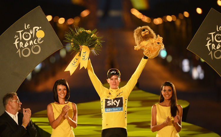 Tour de France 2013 winner, Britain's Christopher Froome poses on the podium after the last stage of the Tour de France cycling race in Paris, France, July 21, 2013. (Photo/Osports)