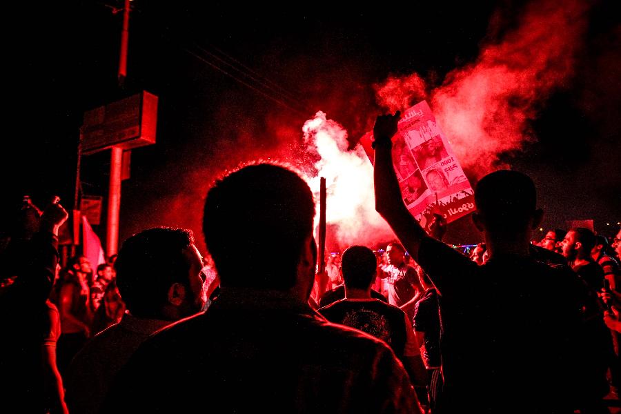 Supporters of Egypt's ousted President Mohamed Morsi take part in a protest in Al-Mansoura city, some 140 kilometers north of Cairo July 21, 2013. Four women supporting Morsi were killed in Al-Mansoura city on July 19, after they were attacked during a rally in the city. (Xinhua/Amru Salahuddien)