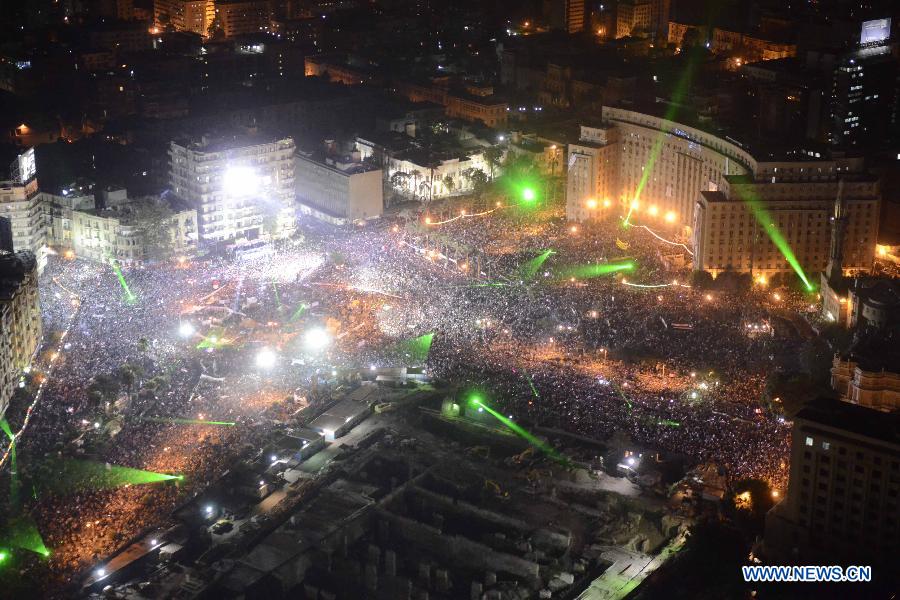 This handout photo released by the Egyptian Army on July 27, 2013, shows pro-military protesters gathering at the Tahrir Square, in Cairo, Egypt, on July 26, 2013. Millions of Egyptians held mass rallies and parade to show their attitude around the country on Friday. Death toll of clashes erupted late Friday between supporters and opponents of Egypt's ousted president Mohamed Morsi has climbed to at least 139 on Saturday, the Muslim Brotherhood (MB) and local media said. (Xinhua/Egyptian Army)