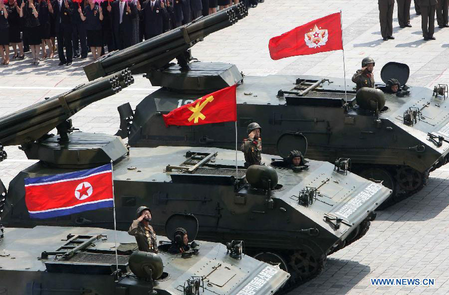 Photo taken on July 27, 2013 shows a military parade held in Pyongyang, the Democratic People's Republic of Korea (DPRK). DPRK held a military parade marking the 60th anniversary of the Korean War Armistice Agreement here on Saturday, the official KCNA news agency reported. (Xinhua/Zhang Li)