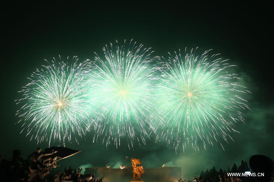 Fireworks are seen in Pyongyang, the Democratic People's Republic of Korea (DPRK), July 27, 2013. A gala of fireworks was held here to mark the 60th anniversary of the Korean War Armistice Agreement here on Saturday. (Xinhua/Zheng Tao)