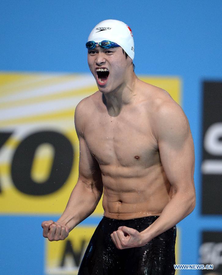Sun Yang of China celebrates after the Men's 400m Freestyle Final of the Swimming competition on day 9 of the 15th FINA World Championships at Palau Sant Jordi in Barcelona, Spain on July 28, 2013. Sun Yang claimed the title with 3 minutes 41.59 seconds.(Xinhua/Guo Yong) 