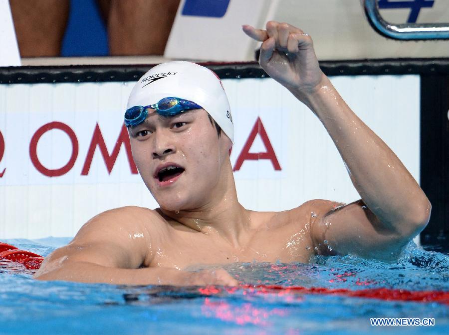 Sun Yang of China celebrates after the Men's 400m Freestyle Final of the Swimming competition on day 9 of the 15th FINA World Championships at Palau Sant Jordi in Barcelona, Spain on July 28, 2013. Sun Yang claimed the title with 3 minutes 41.59 seconds.(Xinhua/Guo Yong) 