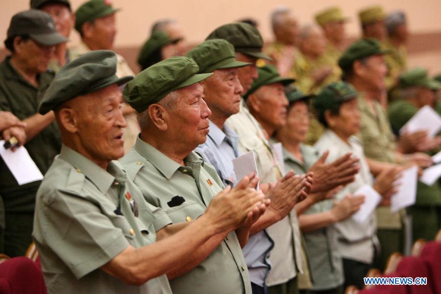 Chinese veterans attend the celebrating ceremony to mark the 60th anniversary of the Korean War Armistice Agreement in Pyongyang, the Democratic People's Republic of Korea (DPRK), on July 29, 2013. (Xinhua/Zhang Li)