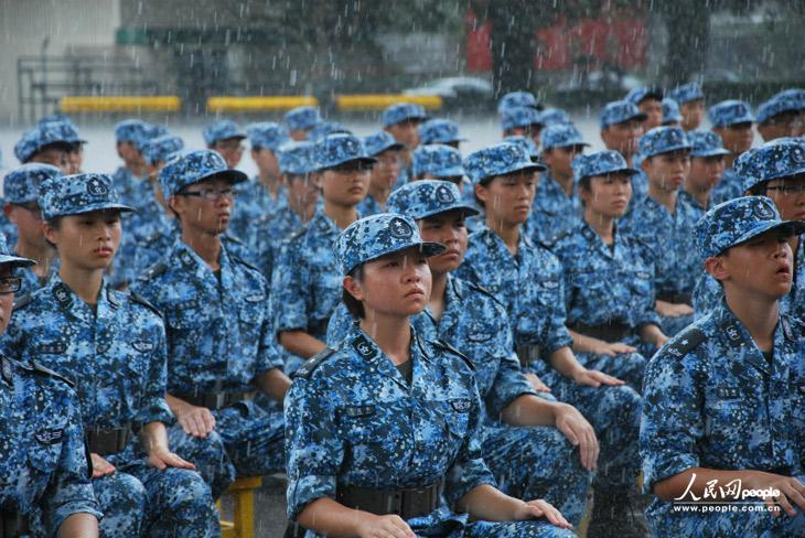 The picture shows Hong Kong teenagers attend a graduation ceremony of the military summer camp on July 28, 2013.  (People's Daily Online/Guo Xiaotong)