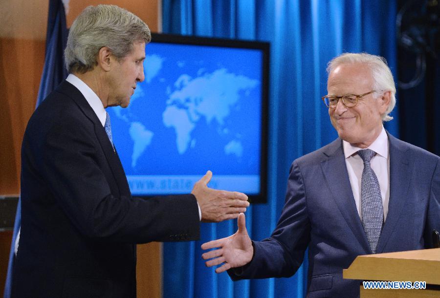 U.S. Secretary of State John Kerry (L) shakes hands with Martin Indyk, a former U.S. ambassador to Israel, after naming him as the special envoy to guide the Israeli-Palestinian peace talks, during a press conference at the State Department in Washington D.C., capital of the United States, July 29, 2013. The Israeli and Palestinian negotiators are set to begin their "initial talks" on Monday evening to lay the groundwork for final status negotiations, which will last at least nine months. (Xinhua/Zhang Jun)