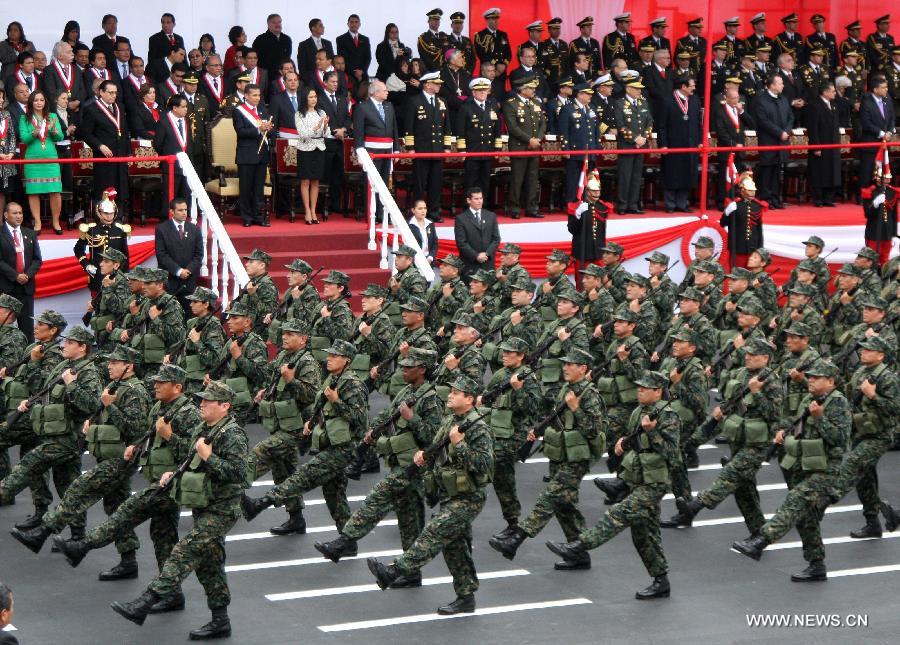 Soldiers participate in the military parade to mark the 192nd Anniversary of Peru's Independence in Lima, Peru, on July 29, 2013. (Xinhua/Luis Camacho)