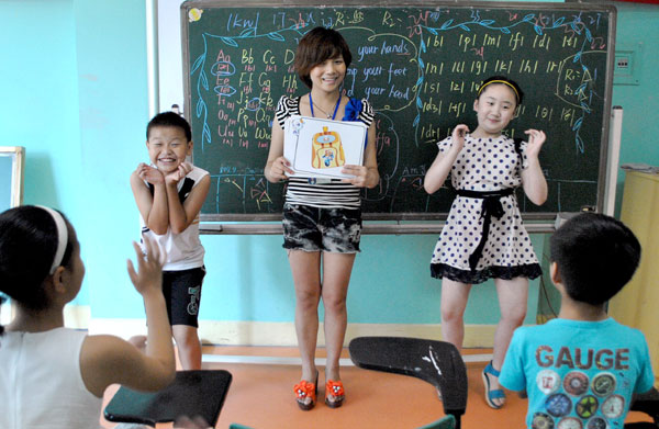 Children at an English class at a training institute in Wenling, Zhejiang province. Provided to China Daily