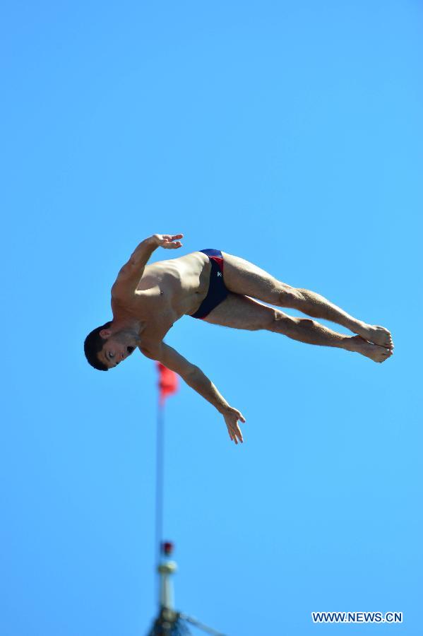 Steve Lobue of the United States competes during the men's high dive at the 15th FINA World Championships in Barcelona, Spain on July 29, 2013. (Xinhua/Guo Yong)