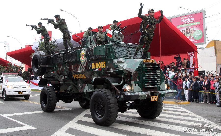 National Police Elements participate in the military parade to mark the 192nd Anniversary of Peru's Independence in Lima, Peru, on July 29, 2013. (Xinhua/Luis Camacho)