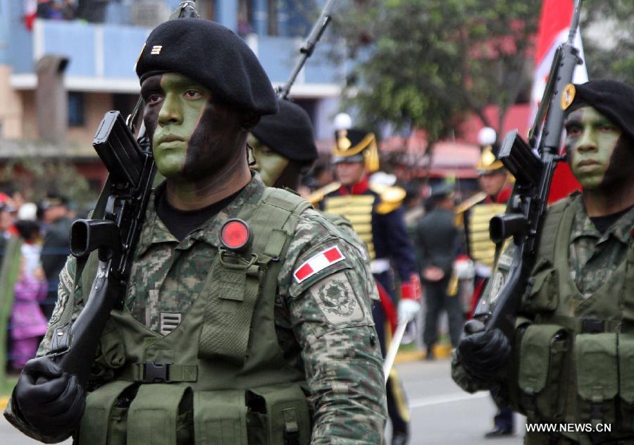 Soldiers participate in the military parade to mark the 192nd Anniversary of Peru's Independence in Lima, Peru, on July 29, 2013. (Xinhua/Luis Camacho)