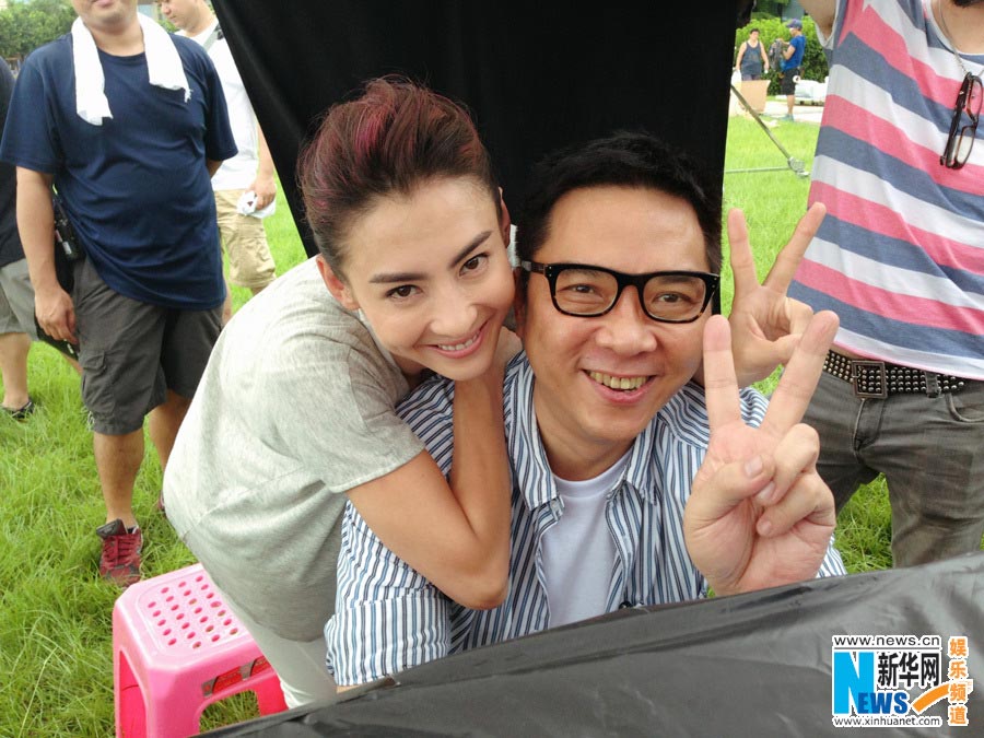 Chinese actress Cecilia Cheung poses for photos of an advertisement. (Photo/Xinhua)
