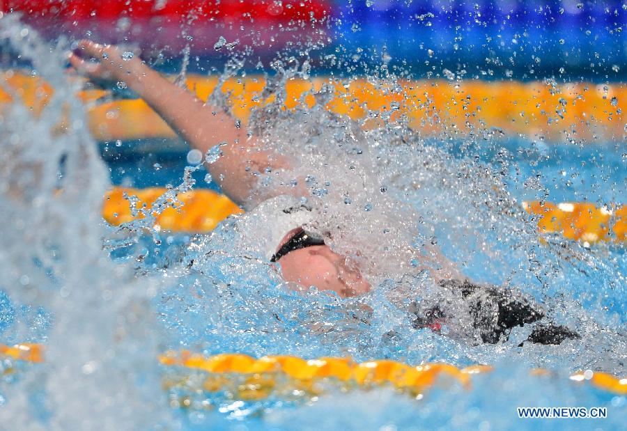 Fu Yuanhui of China competes during the women's 50m backstroke heats of the swimming competition at the 15th FINA World Championships in Barcelona, Spain on July 31, 2013. (Xinhua/Guo Yong)