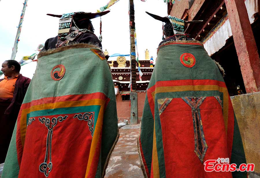 Tibetan women in traditional 'peacock costume' in a village of Burang County, Ngari Prefecture. (CNS/Li Lin)