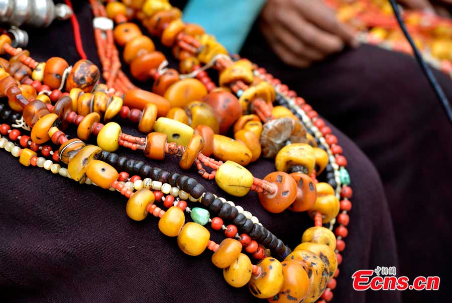 Decorations on the traditional 'peacock costume'.(CNS/Li Lin)