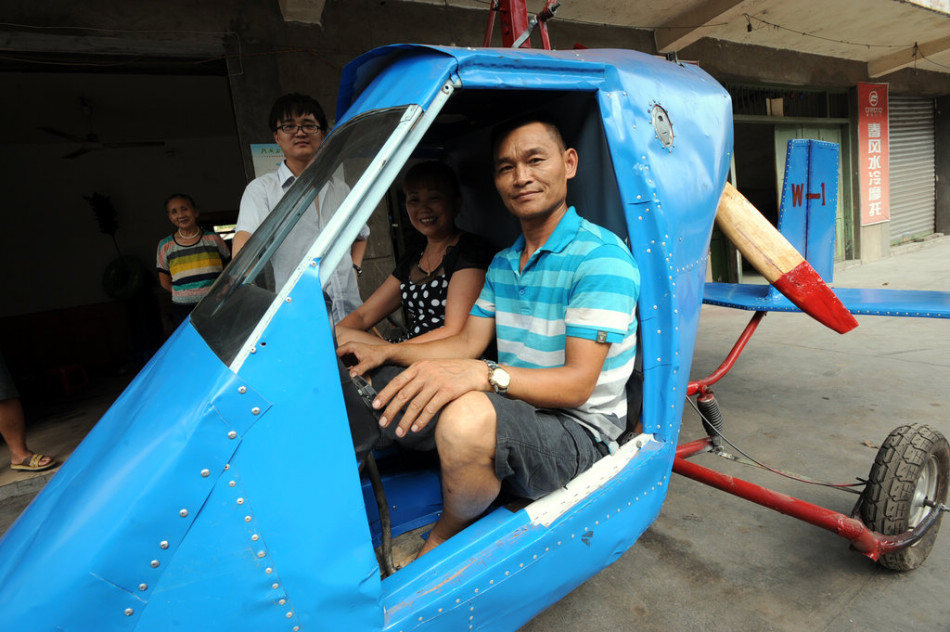 Wen Jiaquan, a 54-year-old repairman, makes a rotorcraft by following the video and indications on Internet in southwest China's Chongqing municipality on July 28, 2013. He and his wife have never flown before but shared the same dream of flying in the sky. Wen who only received primary school education has spent 10,000 yuan ($1,630) on the semi-finished rotorcraft. As the rotorcraft hasn't been finished, we still don't know if it can be a success. (Photo/GMW)