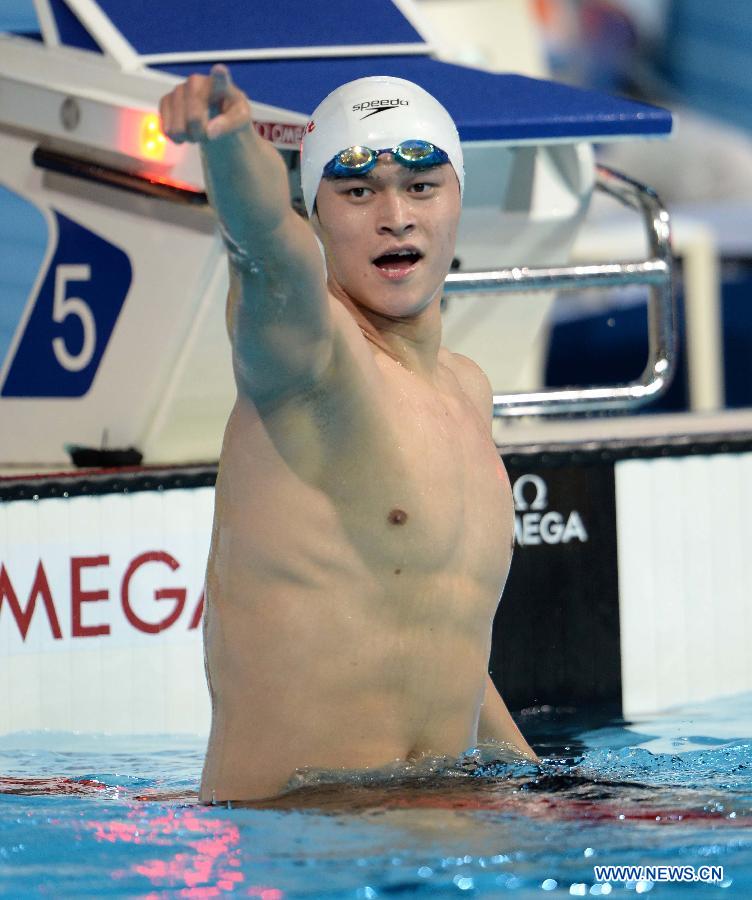 Sun Yang of China reacts after winning the men's 800m freestyle final of the swimming competition at the 15th FINA World Championships in Barcelona, Spain on July 31, 2013. Sun Yang won the gold medal with 7 minutes and 41.36 seconds. (Xinhua/Guo Yong)