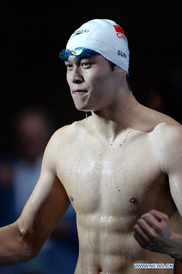 Sun Yang of China reacts after winning the men's 800m freestyle final of the swimming competition at the 15th FINA World Championships in Barcelona, Spain on July 31, 2013. Sun Yang won the gold medal with 7 minutes and 41.36 seconds. (Xinhua/Guo Yong)