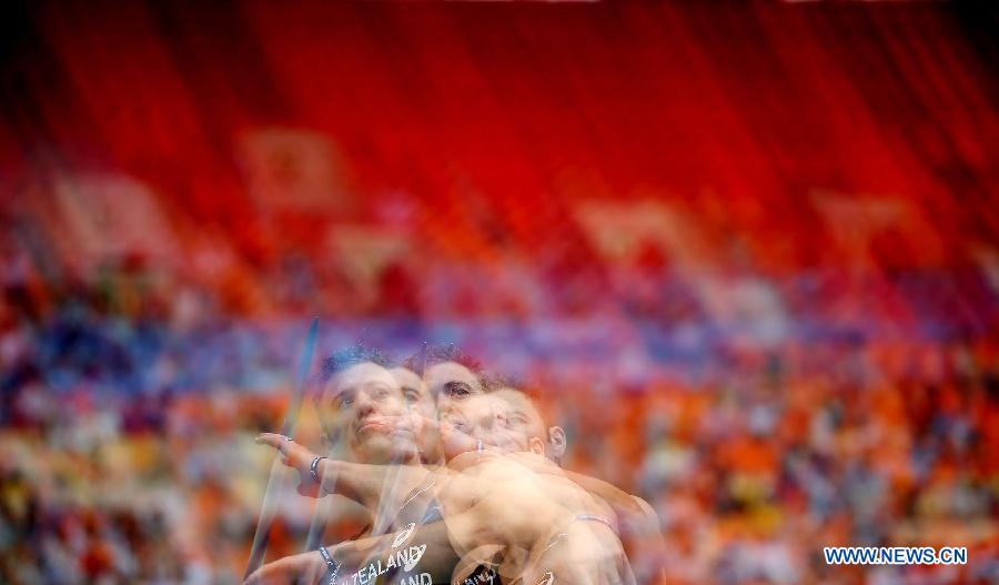 Stuart Farquhar of New Zealand competes during the Men's Javelin Throw Qualification of the 14th IAAF World Athletics Championships Moscow 2013 at Luzhniki Stadium in Moscow, Russia on Aug. 15, 2013. (Photo taken using multiple exposure) (Xinhua/Li Ming)