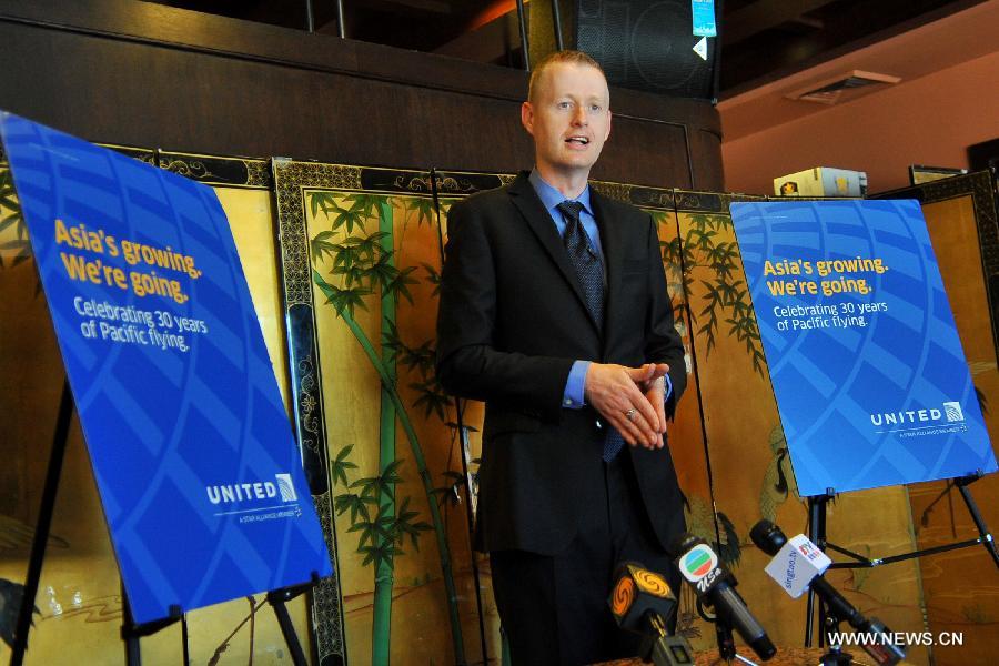 Brian Andrew Znotins, vice president of United Airlines Atlantic and Pacific Sales, introduces the new non-stop service between Chengdu and San Francisco in San Francisco, the United States, Aug. 30, 2013. United Airlines is to offer a non-stop service between Chengdu, capital of southwest China's Sichuan Province, and San Francisco of the United States from June 11 next year.(Xinhua/Liu Yilin)