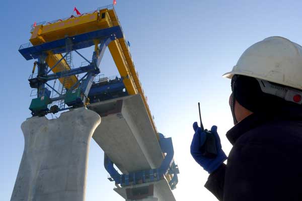 According to experts, it is reasonable for China to adopt an "infrastructure going ahead" strategy in its go-west campaign. The problem, however, is the breakneck infrastructure investment pace has not been followed with industrial investment growth, primarily led by the private sector.[Cai Zengle / for china daily]