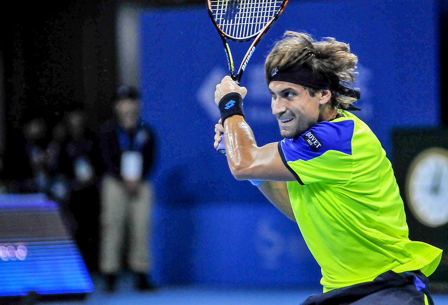 World No.4 David Ferrer plays in the first round of the China Open tennis tournament. (Li Zhenyu/People's Daily Online)
