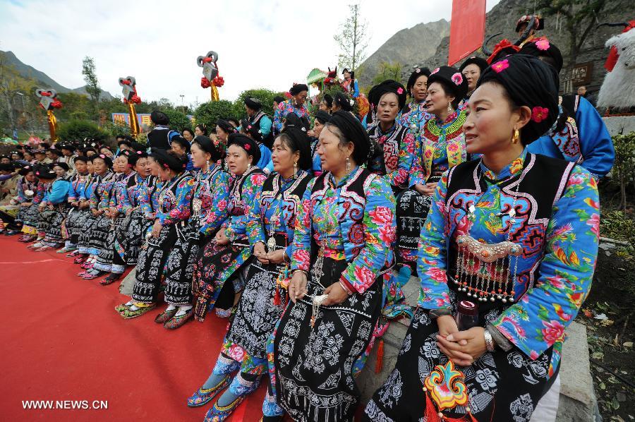 People of Qiang ethnic group sing during the celebration of their new year in Lixian County of southwest China's Sichuan Province, Nov. 3, 2013. The New Year of Qiang ethnic group falls on Nov. 3 this year. (Xinhua/He Haiyang) 