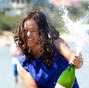 Li Na poses with trophy on Brighton Beach in Melbourne 