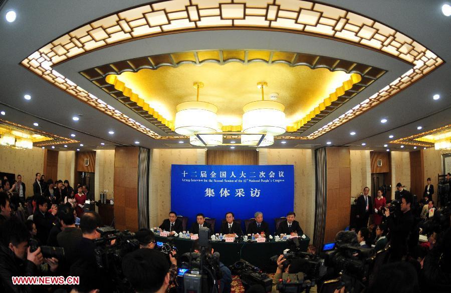 NPC deputies give press conference on industrial restructuring