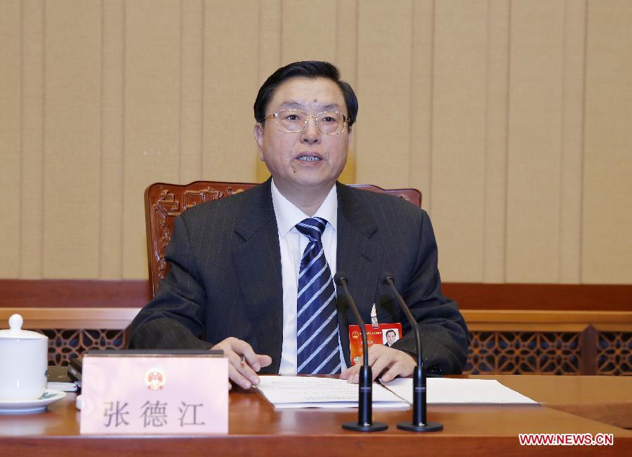 Zhang Dejiang presides over 4th meeting of presidium of 2nd session of NPC