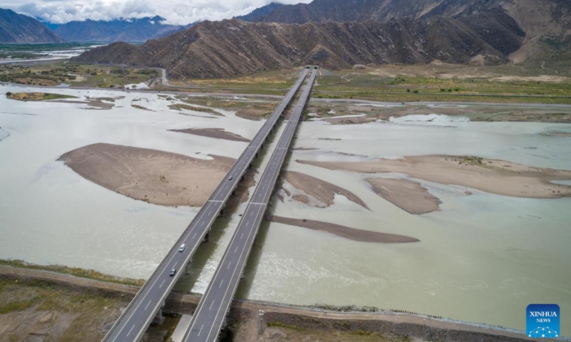 An aerial drone photo taken on June 27, 2024 shows a view of a high-grade highway linking Lhasa and Xigaze in southwest China's Xizang Autonomous Region. 