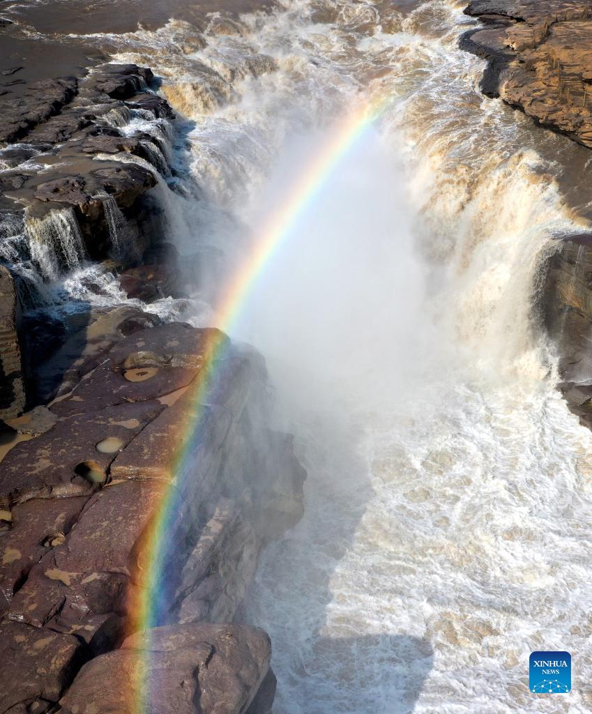 In pics: rainbow over Yellow River's Hukou Waterfall in Shaanxi