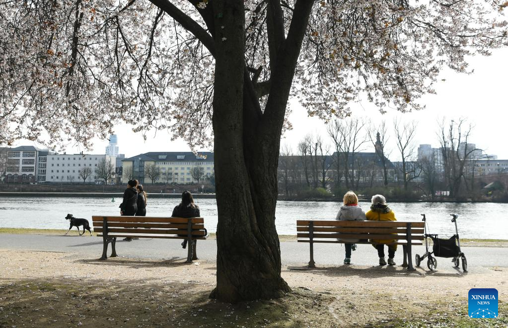People enjoy spring time in Frankfurt, Germany