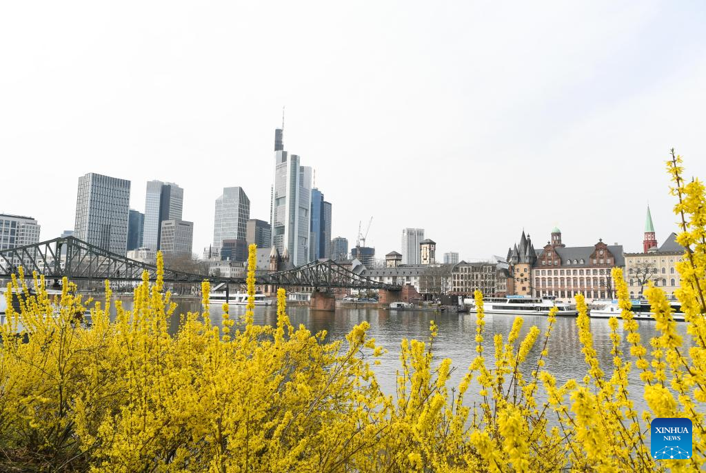 People enjoy spring time in Frankfurt, Germany