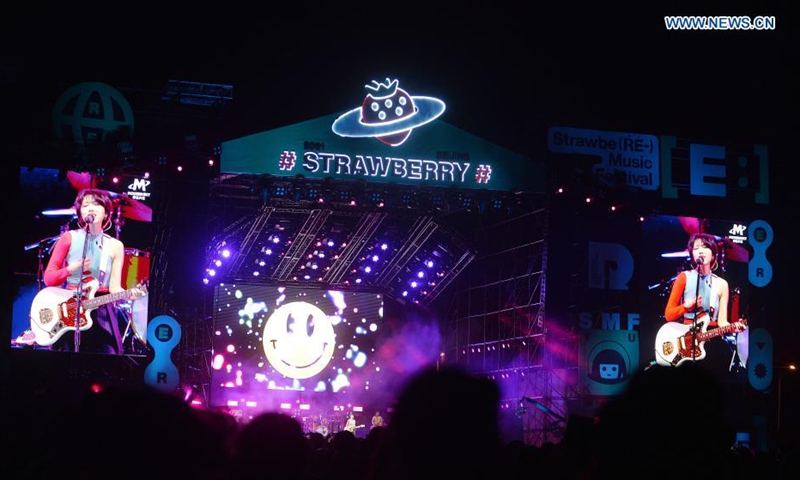 A band performs at the Strawberry Music Festival in Beijing, capital of China, May 2, 2021. The 2021 Strawberry Music Festival is held at Beijing Expo Park from May 2 to May 4. (Xinhua/Xiao Xiao)