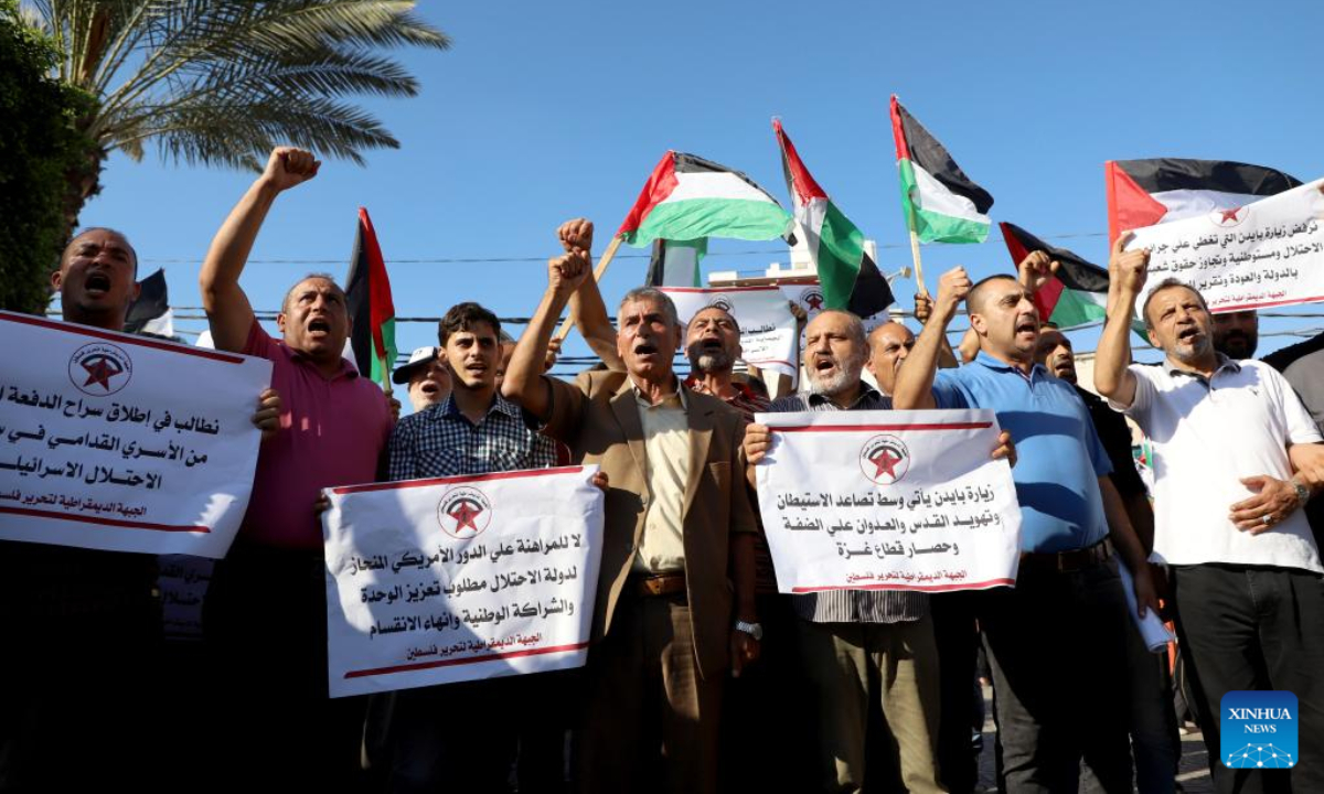 Palestinians protest against US President Joe Biden's visit, in Gaza City, on July 14, 2022. Thousands of Palestinians on Thursday staged demonstrations in the West Bank and Gaza Strip against US President Joe Biden's first visit to Israel and the Palestinian territories, slamming his biased stance on the Israeli-Palestinian issue. Photo:Xinhua