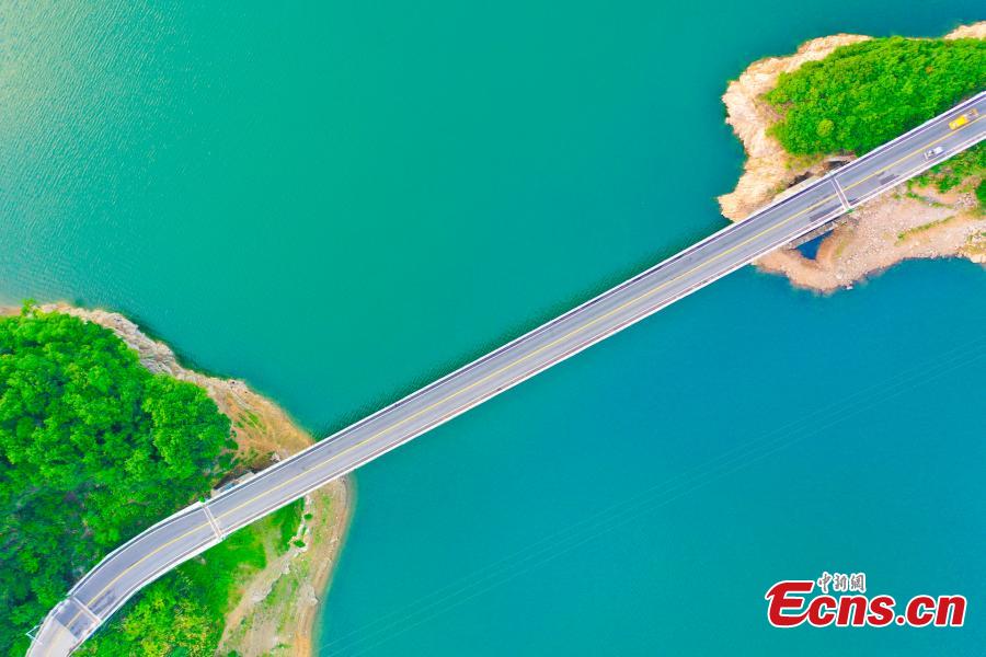 Aerial view of Jinzhai bridge across Meishan Reservoir in Anhui