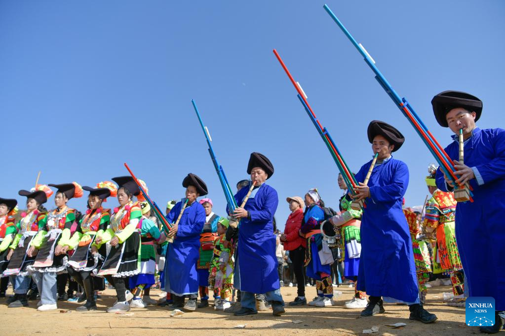 Miao people participate in traditional dancing activity in SW China's Guizhou