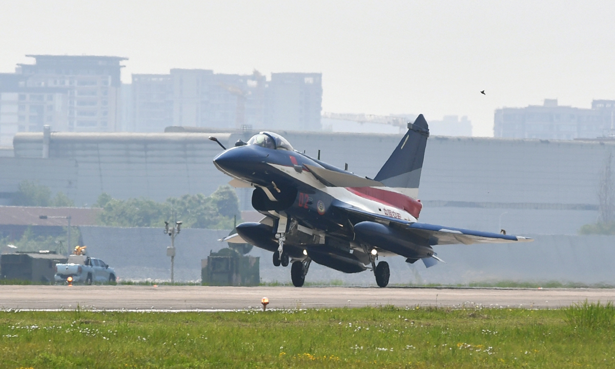 A J-10C fighter jet of the Bayi Aerobatic Team of the Chinese People's Liberation Army Air Force takes off from an airfield after being delivered in spring 2023. Photo: Courtesy of Aviation Industry Corp of China