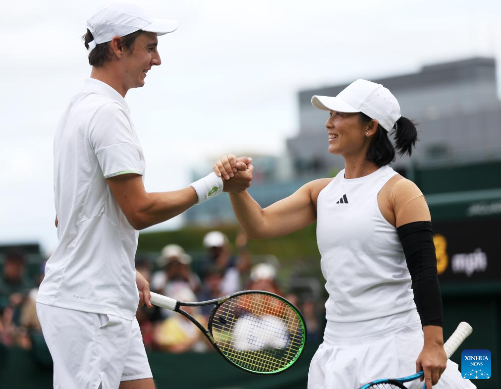 Xu/Vliegen win mixed doubles semifinal match at Wimbledon