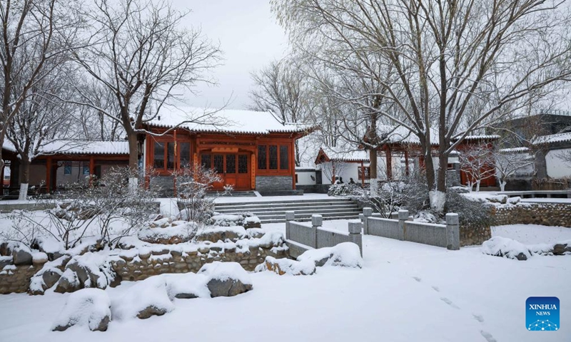 This photo taken on Dec. 11, 2023 shows the snow scenery of the Beijing Garden Expo Park in Beijing, capital of China.(Photo: Xinhua)