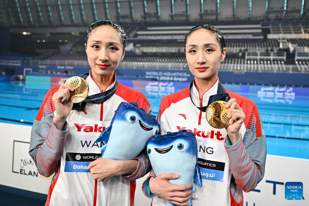 Chinese artistic swim sister duo bags back