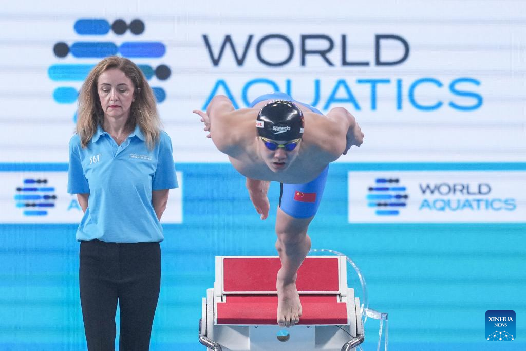 China's Dong surges to win men's 200m breaststroke world title
