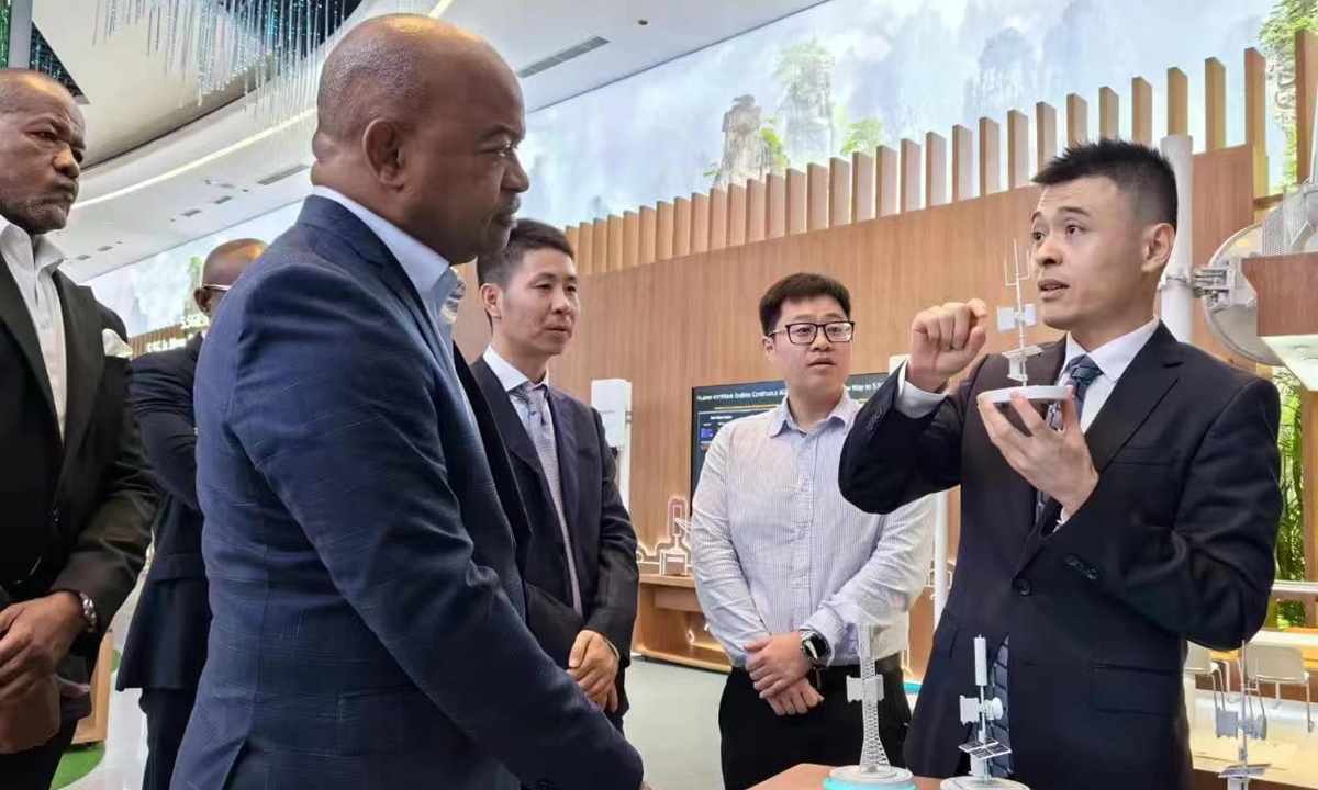 Mário Augusto da Silva Oliveira, Angola’s Minister of Telecommunications, Information Technologies and Social Communication (second from left) during a visit to China in late June Photo: Courtesy of the Angolan Embassy in Beijing