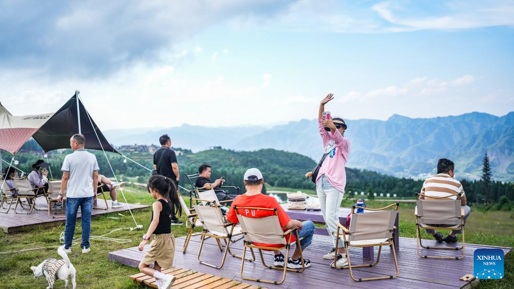 Haiping Yi ethnic cultural township sees summer tourism surge