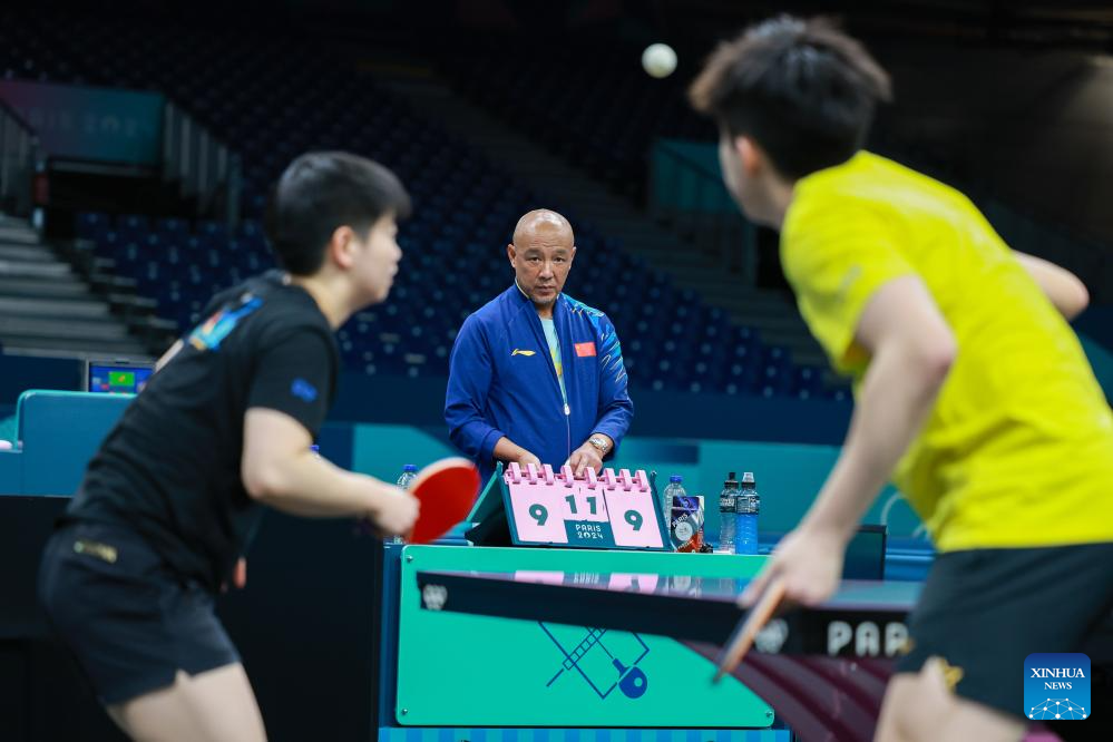 Chinese national table tennis team attends training session ahead of Paris 2024